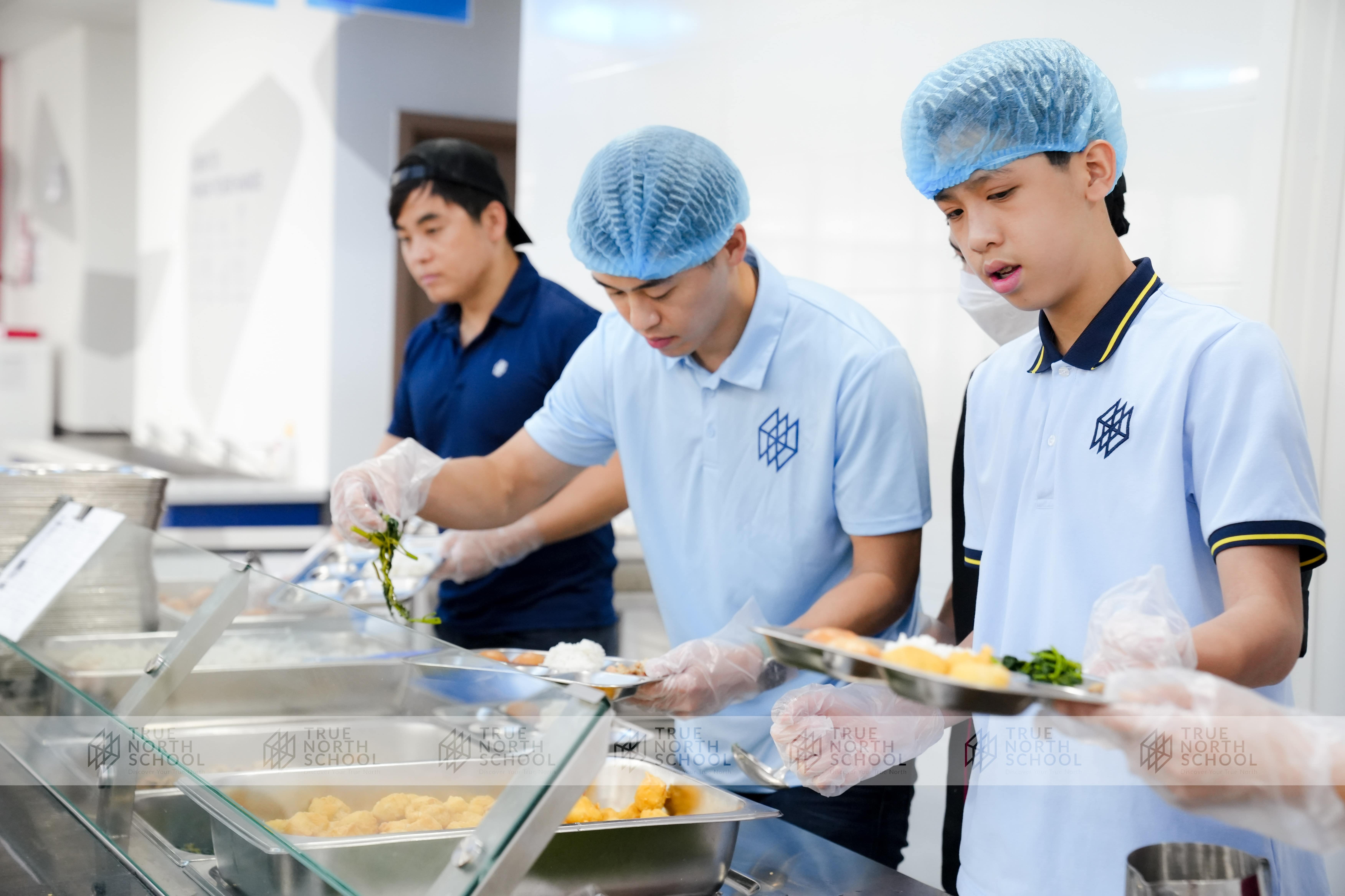 TNS men served lunch to women on Women’s Day
